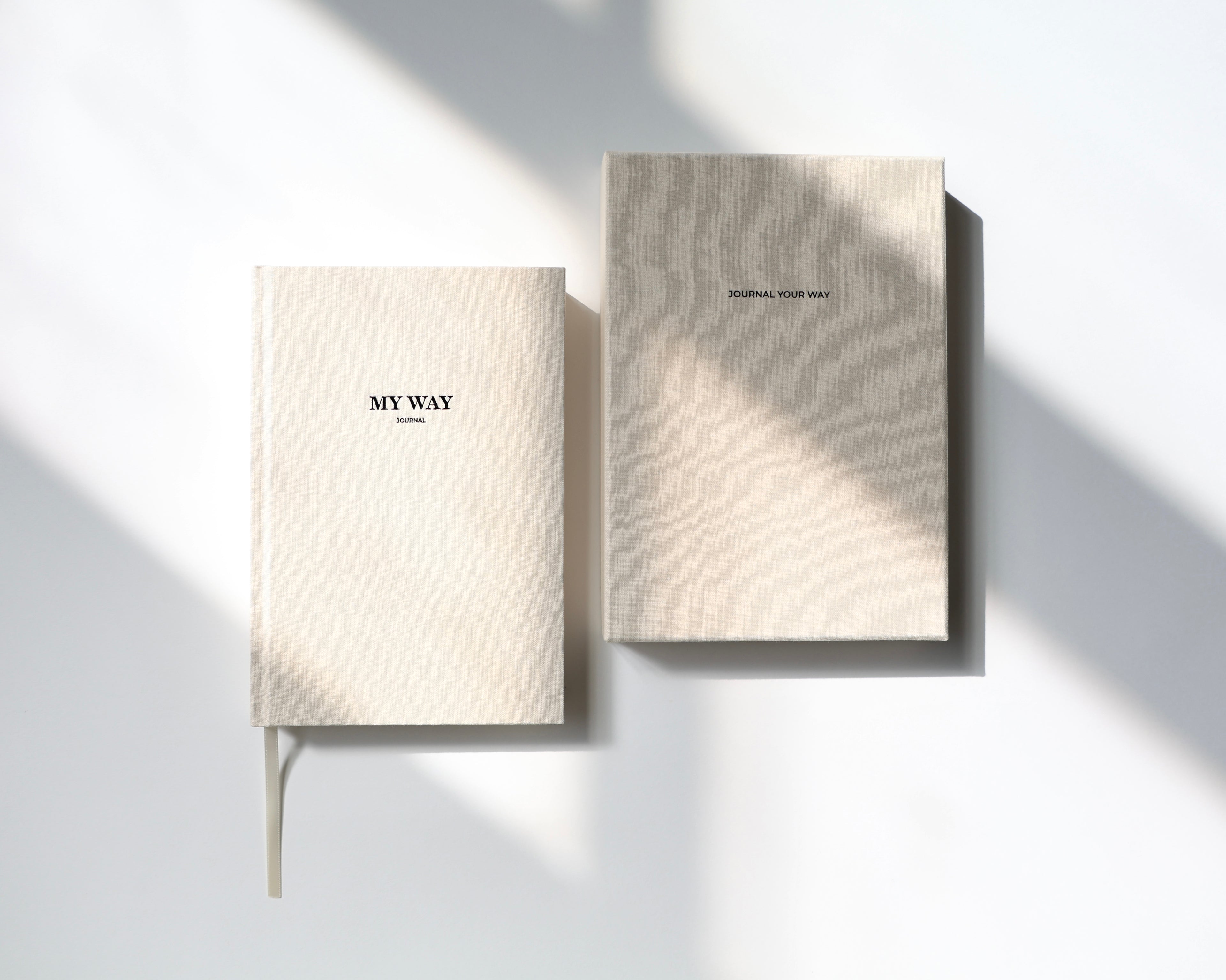 Beige linen My Way Journal and matching premium gift box on a minimal white background with soft natural sunlight, undated planner and reflection journal set.