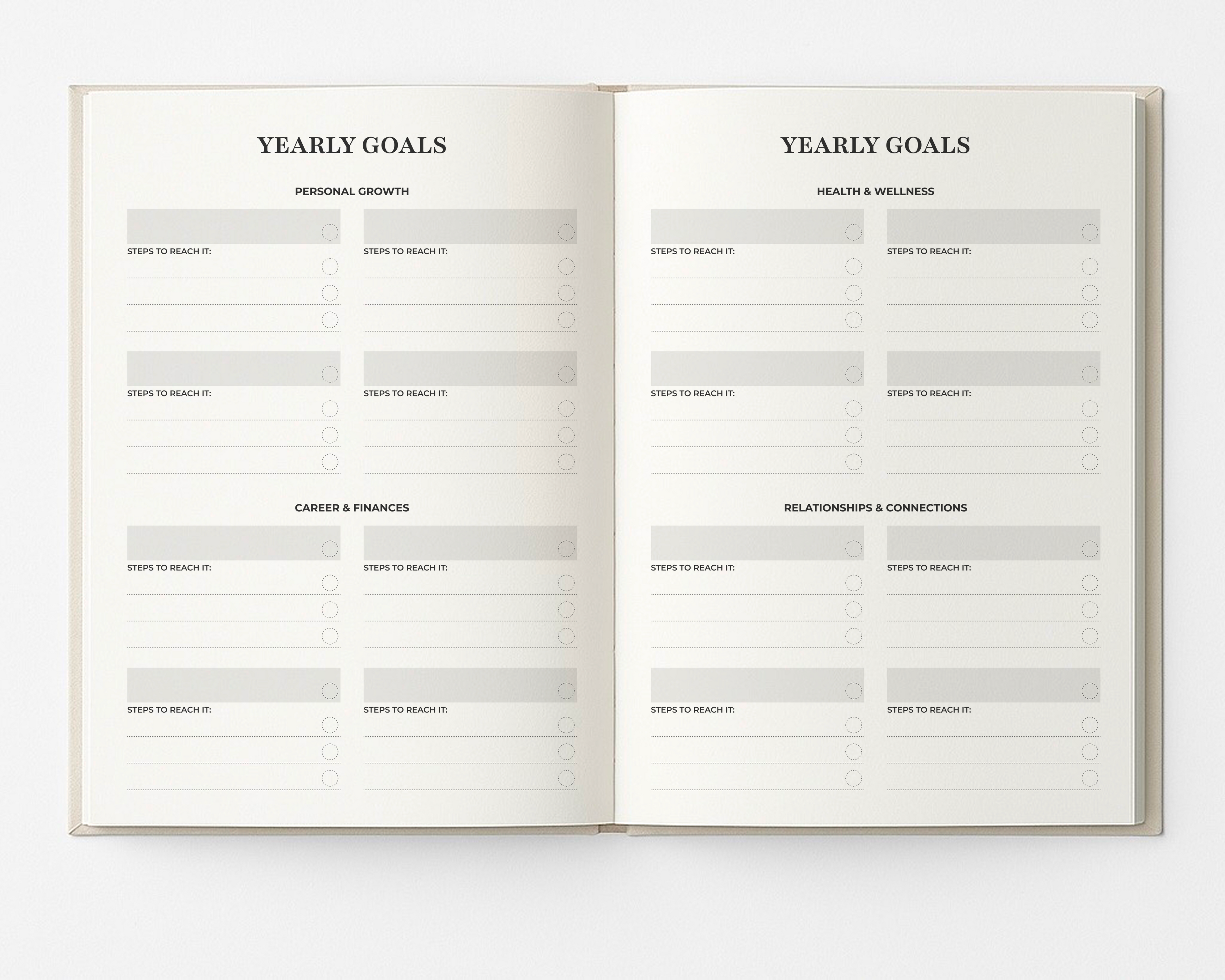 Open My Way Journal showing the yearly goals pages with sections for personal growth, career and finances, health and wellness, and relationships, including step-by-step goal planning in the undated planner and reflection journal.